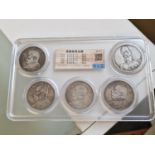 Sealed Collection of Four Chinese Silver Coins