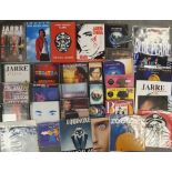 Collection of Jean-Michel Jarre releases on multiple formats, including 3 VHS videos, 1 DVD, 2 audio