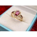 18ct Gold, Ruby and Diamond Ring, size K+0.5 and 3.49g