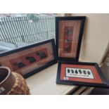 Trio of Box Framed Stone Sculpted African Tribal Elephant and Facial Figures