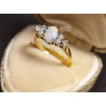 18ct Gold, Opal and Diamond Cluster Ring, size J+0.5, 2.9g