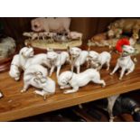 Group of Eight White European Porcelain Hunting Dog Figures