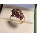 Large 9ct Gold, Ruby & Diamond Cluster Ring 2.3g and size O+0.5