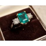 18ct Yellow and White Gold, Diamond & 4ct Emerald Ring - inc 0.5ct diamonds either side of central e