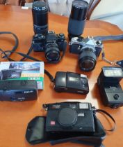 Pentax ME Super SLR camera w. 35-70mm lens, Contax 139 Quartz SLR camera w. Yashica 28mm lens, 2 add