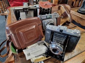 Quartet of Vintage Cameras inc a Zeiss Ikon Nettar, Polaroid, and Kodak