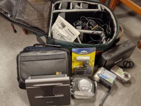 Collection of Electronics Equipment, Panasonic Portable DVD, Sony Handycam, Sony Cybershot, Soundbla
