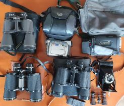 Sony Video Hi8 HandyCam + case, Canon MV 650i digital vieo camera + case, 6 assorted pairs of binocu