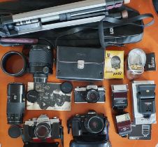 Minolta 7000 digital SLR camera + 28-85 lens, 2 SLR cameras + 50mm lenses (Praktica/Yashica), 2 lens