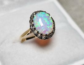 9ct Gold, Opal & Diamond Dress Ring. Size K and weighs 2.9g approx