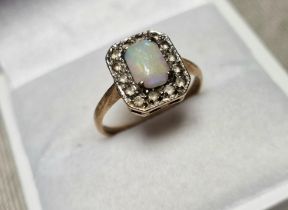 9ct Gold, Opal & Diamond Dress Ring. Size K and weighs 2.9g approx
