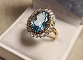 9ct Gold, Blue Topaz & Diamond Dress Ring w/0.5ct of diamonds - 5.2g & size P