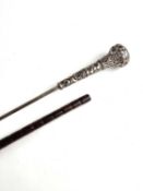 A nice quality gentleman's sword cane, late 19th century, with a white metal handle marked '