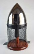 A modern replica of a Norman nasal helmet with chainmail aventail, sold together with a helmet