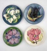 Four Moorcroft pin dishes including Bermuda Lily and Black Tulip