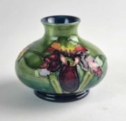 A small William Moorcroft 'Orchid' vase