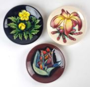 Three Moorcroft pin dishes including Red Tulip