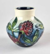 A small Moorcroft Trial vase designed by Emma Bossons