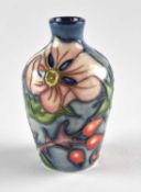 A miniature Moorcroft vase designed by Jeanne McDougall