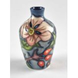 A miniature Moorcroft vase designed by Jeanne McDougall