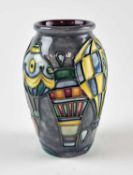 A small Moorcroft 'Balloon' vase designed by Jeanne McDougall