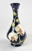 Moorcroft 'Chatsworth Orchid' vase designed by Philip Gibson