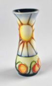 Moorcroft vase decorated with a sun