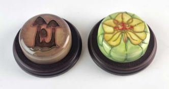 Two Moorcroft paperweights