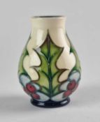 A small Moorcroft 'Holly' vase