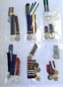 A folder of assorted medals, predominantly miniatures