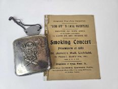 U.S Army Coast Artillery Corps cigarette case, a dog tog and a Boer War smoking concert programme