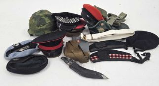 Assorted military hats and uniform