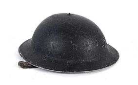 A British MK2 Army Steel Brodie helmet, with liner and chinstrap, chin bales dated 1938, with