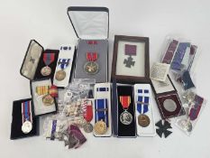 An accumulation of modern medals, including United States of America bronze star in case with ribbon