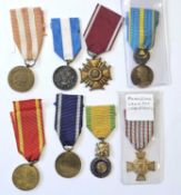 Foreign medals. Comprising a Swedish Blue Star Society Badge of Merit; Polish Second World War