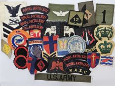 Thirty-three assorted military cloth badges, WW2 to modern, including United Nations, WO2 (RQMS)