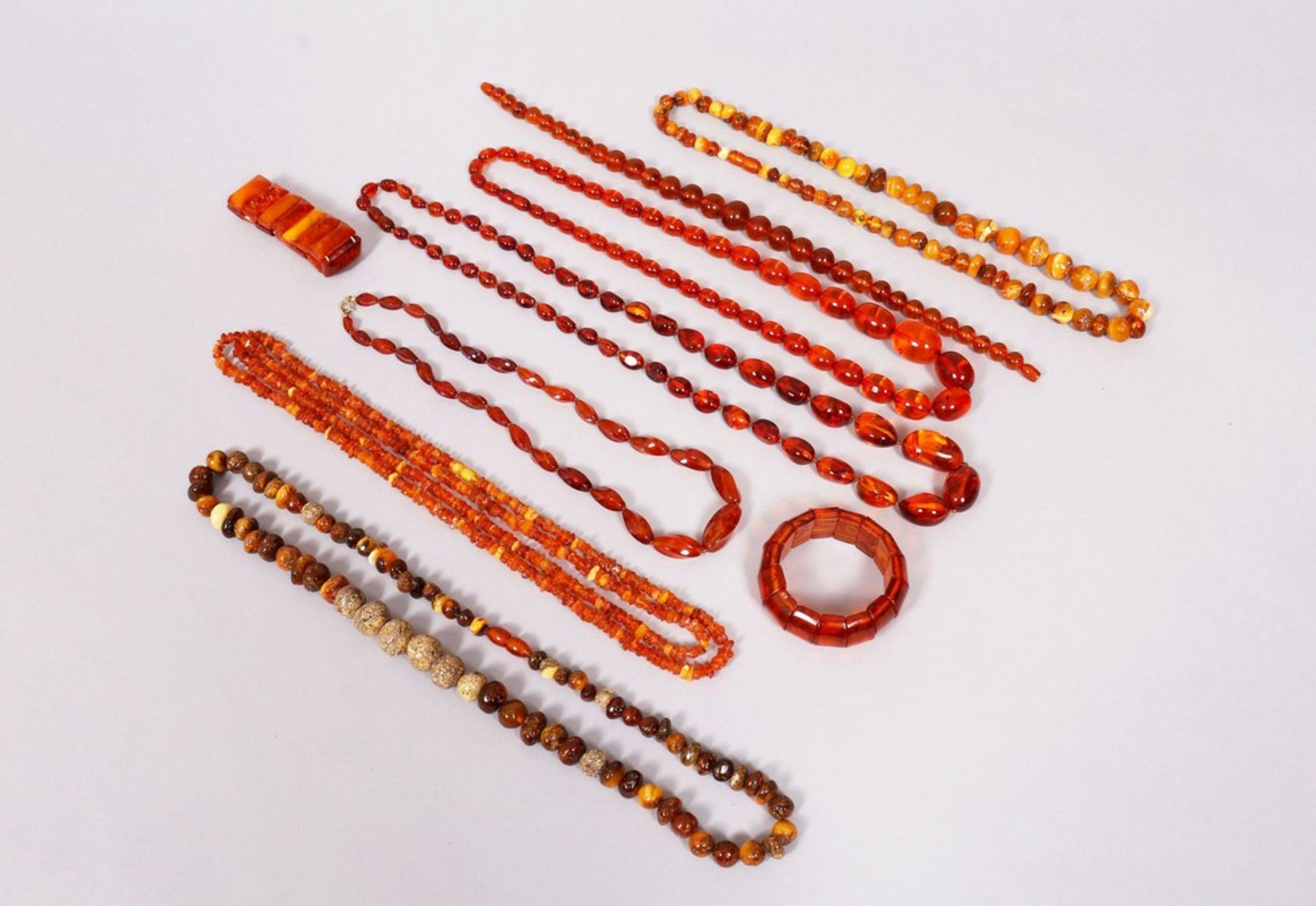 8 amber necklaces and 2 bracelets