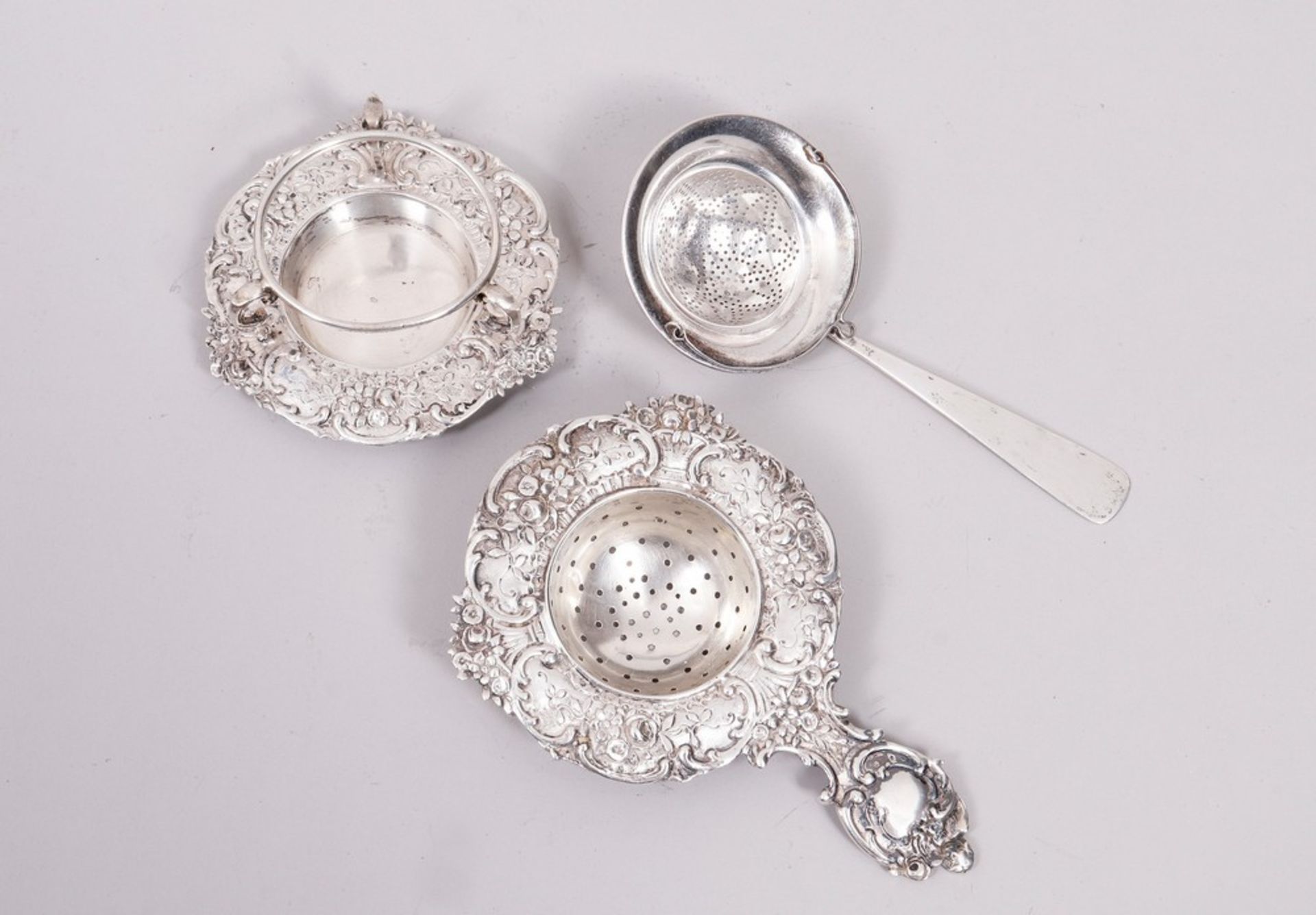 2 tea strainers, 800 silver, German and others, c. 1900, 3 pcs.