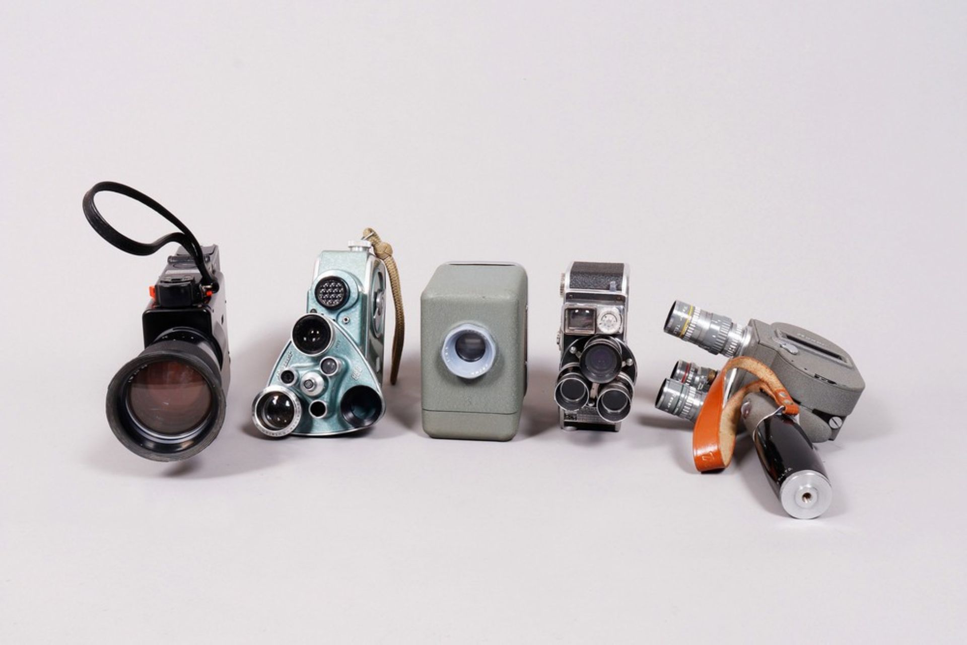 4 film cameras, different manufacturers, 1950s - 80s