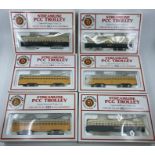 A collection of Bachmann HO Gauge Streamline tram cars and 2x bodies without motors/chassis - All