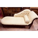 A Victorian and later mahogany chaise lounge, scrolling back and armrest, later upholstery, raised