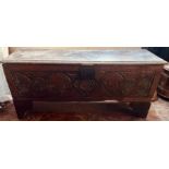 A William & Mary oak and later coffer, single plank moulded edge hinged lid, enclosing a candle box,