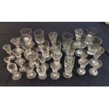 A collection of 18th & 19th century drinking glasses to include; etched ale glasses, rummers,