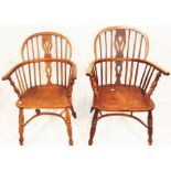 A low back elm Windsor chair, spindle back and pierced splat, moulded seat, raised on turned