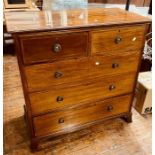 A late Victorian mahogany crossbanded chest of drawer, rectangular form, slight oversailing top,