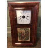 An American wall clock contained in wooden rosewood style case, pendulum and bob present, 20cms