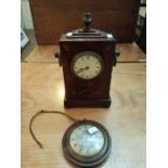 A late 19th century mahogany and brass inlaid mantel clock with wooden ring handles (finial AF) (