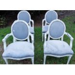 A set of 12 Victorian style painted armchairs, oval back with upholstered inlay and beaded frame,