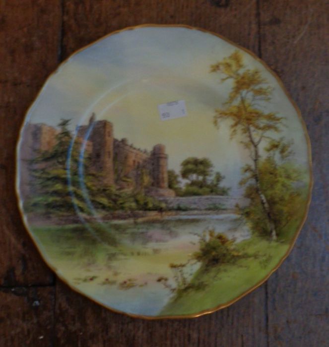 A Royal Worcester hand-painted cabinet plate with a date code of 1955 to the reverse. The front side