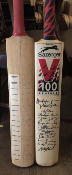 Two signed cricket bats, one signed by the Pakistan team (2)